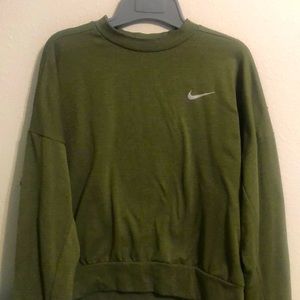 Medium Nike dri-fit sweater in olive color. With zippers, finger hole and cover.